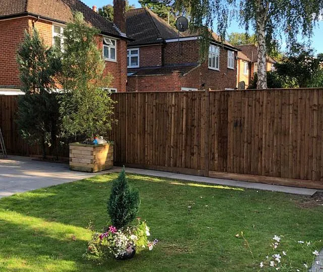 A tall garden fence