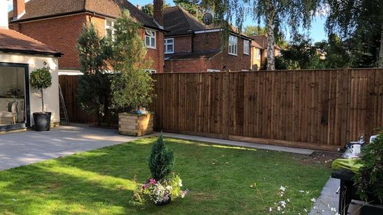 A tall garden fence