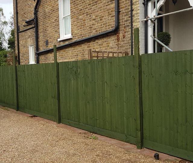 A newly painted and installed fence